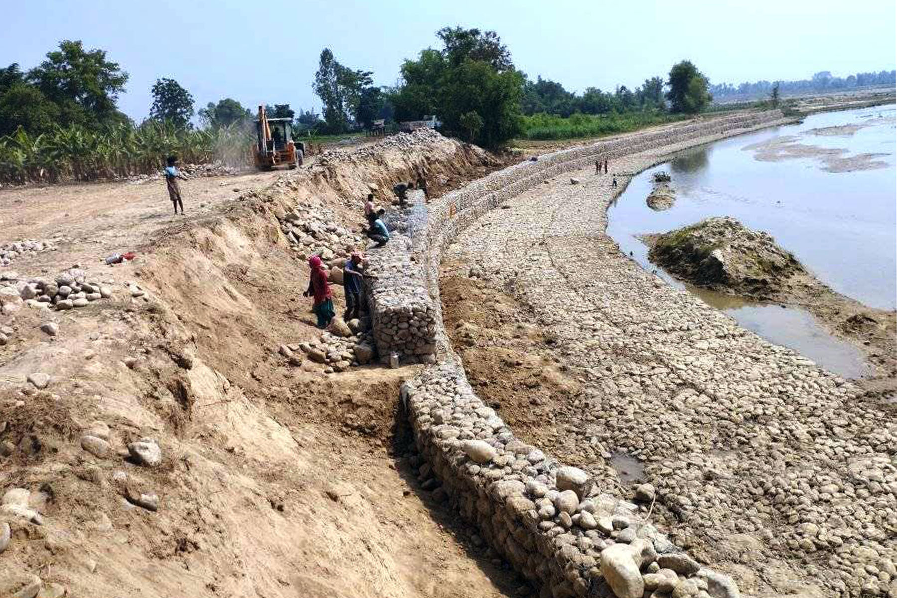 दोदा नदीमा तटबन्ध निर्माण